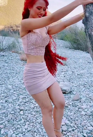 2. Bella Dueñas Shows Cleavage in Inviting Crop Top