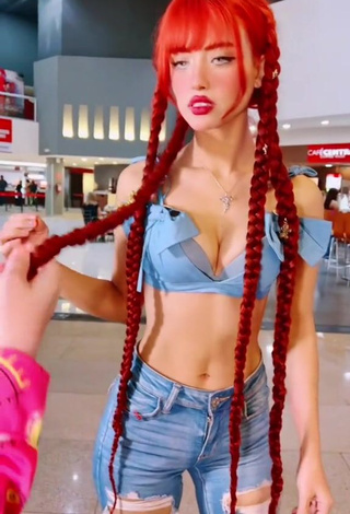 2. Bella Dueñas Shows Cleavage in Erotic Blue Crop Top