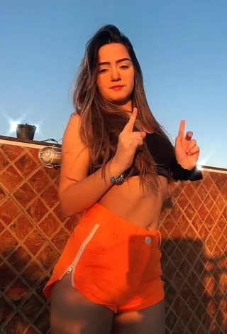 3. Sexy Camilla Rocha Shows Cleavage in Black Crop Top