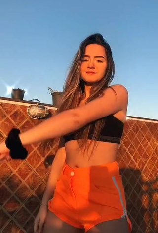 4. Sexy Camilla Rocha Shows Cleavage in Black Crop Top