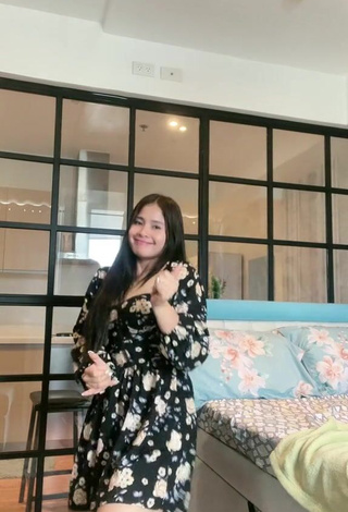 6. Hottie Christian Mae Shows Cleavage in Floral Dress
