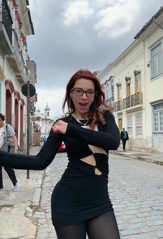 Sexy Cibelly Ferreira Shows Cleavage in Black Dress in a Street
