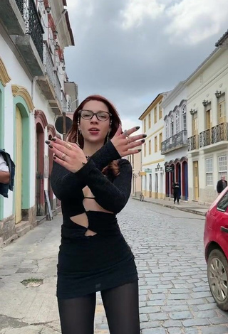 2. Sexy Cibelly Ferreira Shows Cleavage in Black Dress in a Street