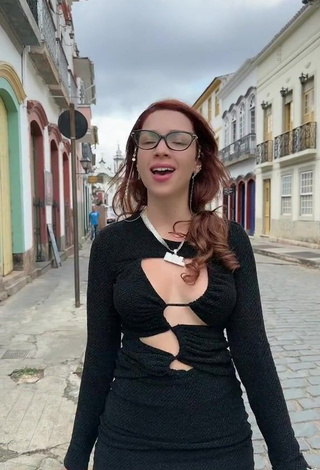 3. Sexy Cibelly Ferreira Shows Cleavage in Black Dress in a Street