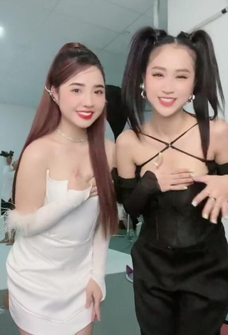 3. Sexy Cindy Diễm Mii Shows Cleavage in White Dress