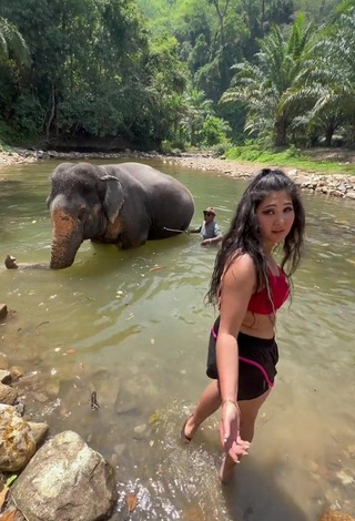 Sexy Hafizova.13 Shows Cleavage in Red Bikini Top