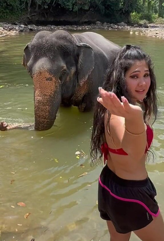 2. Sexy Hafizova.13 Shows Cleavage in Red Bikini Top