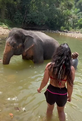 3. Sexy Hafizova.13 Shows Cleavage in Red Bikini Top