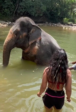 4. Sexy Hafizova.13 Shows Cleavage in Red Bikini Top
