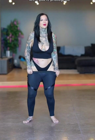 Alluring Heidi Lavon Shows Cleavage in Erotic Black Crop Top