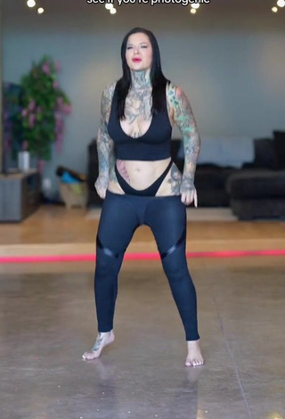 2. Alluring Heidi Lavon Shows Cleavage in Erotic Black Crop Top