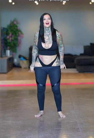5. Alluring Heidi Lavon Shows Cleavage in Erotic Black Crop Top