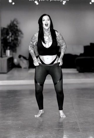 6. Alluring Heidi Lavon Shows Cleavage in Erotic Black Crop Top