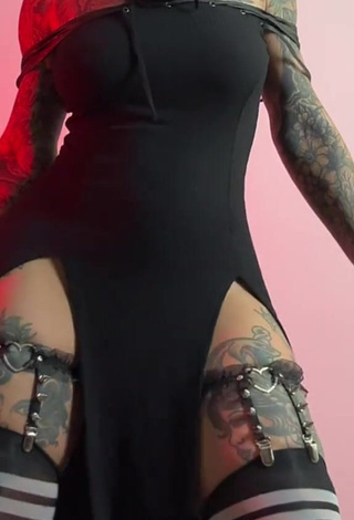 4. Hot Heidi Lavon Shows Cleavage in Black Dress