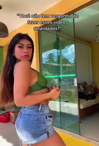 4. Lovely Ingrid Ohara Shows Cleavage in Green Bikini