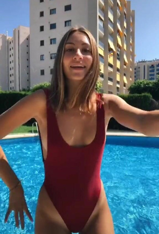 2. Hot Laura Rodero in Red Swimsuit at the Swimming Pool