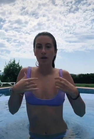3. Alluring Laura Rodero in Erotic Purple Bikini at the Swimming Pool