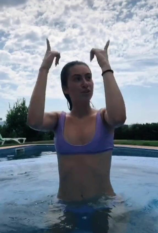 5. Alluring Laura Rodero in Erotic Purple Bikini at the Swimming Pool