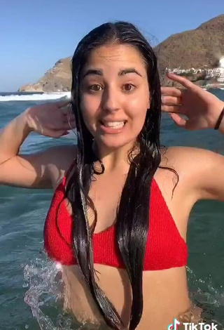 3. Hot Laura López in Red Bikini Top in the Sea