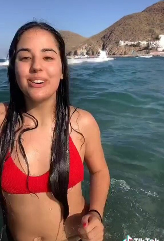 4. Hot Laura López in Red Bikini Top in the Sea