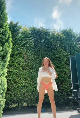 2. Sexy Leonie Leoobalys in White Bikini Top
