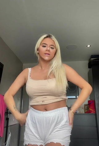 Sexy Mellbelle Shows Cleavage in Beige Crop Top