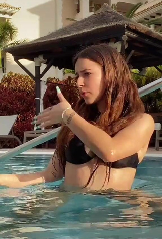2. Sexy Mónica Morán in Black Bikini Top at the Pool