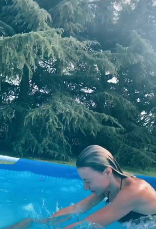 5. Amazing Martina Picardi in Hot Black Bikini Top at the Pool