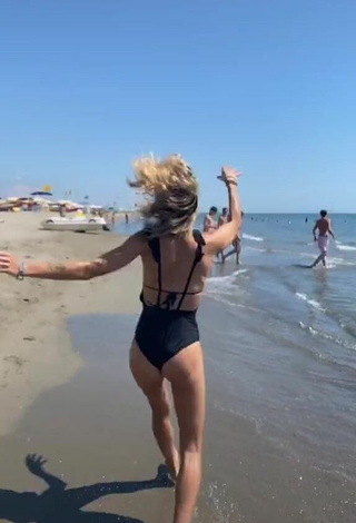 Beautiful Martina Picardi in Sexy Black Swimsuit at the Beach