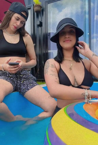 2. Attractive Jenny Camacho Shows Cleavage in Black Bikini Top