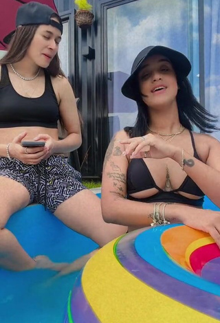 3. Attractive Jenny Camacho Shows Cleavage in Black Bikini Top
