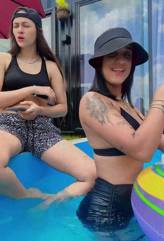 5. Attractive Jenny Camacho Shows Cleavage in Black Bikini Top