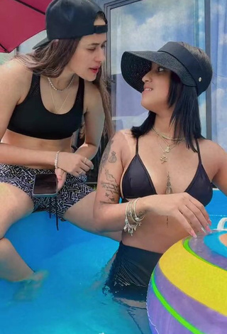 6. Attractive Jenny Camacho Shows Cleavage in Black Bikini Top