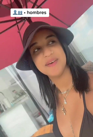 2. Adorable Jenny Camacho Shows Cleavage in Seductive Black Bikini Top