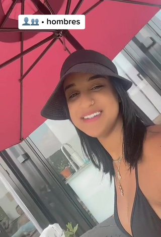 3. Adorable Jenny Camacho Shows Cleavage in Seductive Black Bikini Top