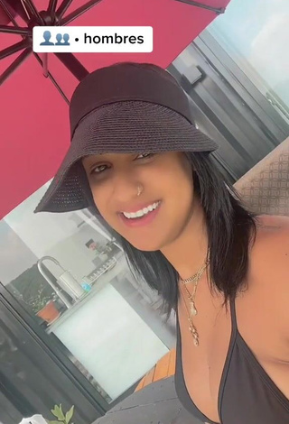 4. Adorable Jenny Camacho Shows Cleavage in Seductive Black Bikini Top