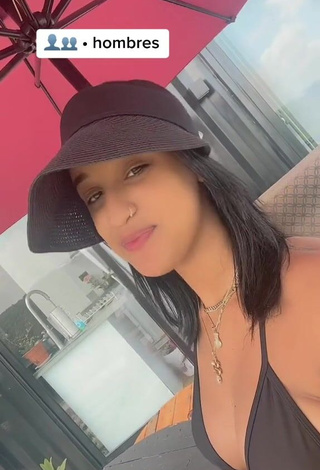 5. Adorable Jenny Camacho Shows Cleavage in Seductive Black Bikini Top