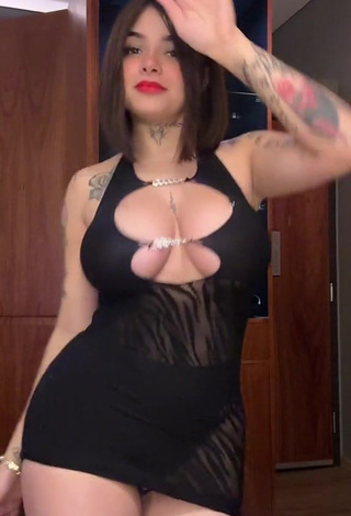 3. Karely Ruiz Shows Cleavage in Seductive Black Dress Braless