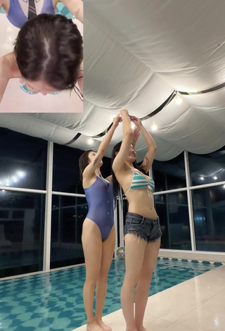 2. Sweetie Yu Baek-hap Shows Cleavage in Striped Bikini Top