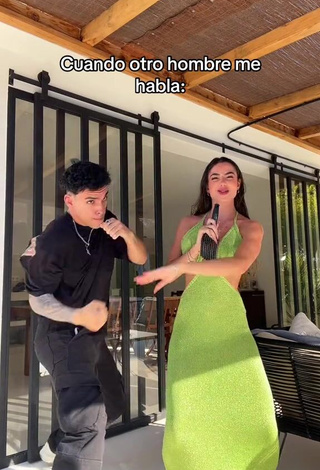 6. Alluring Lola Moreno Marco Shows Cleavage in Erotic Light Green Dress
