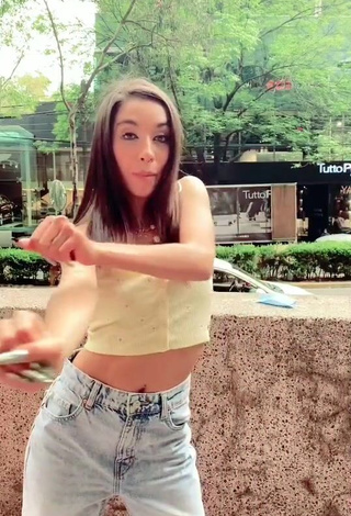 2. Elegant Maria Becerra Shows Cleavage in Crop Top in a Street