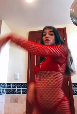 4. Cute Maria Becerra Shows Cleavage in Red Dress