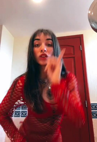 6. Cute Maria Becerra Shows Cleavage in Red Dress