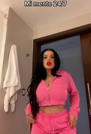 2. Erotic Marlene Santana Shows Cleavage in Peach Crop Top