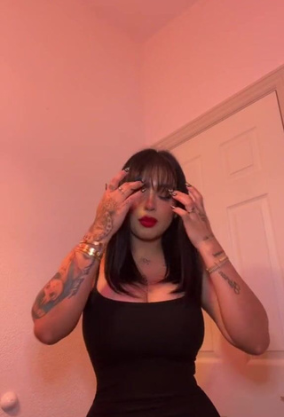 Elegant Marlene Santana Shows Cleavage in Black Dress