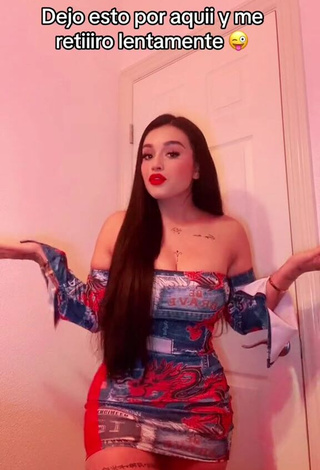 2. Gorgeous Marlene Santana Shows Cleavage in Alluring Dress