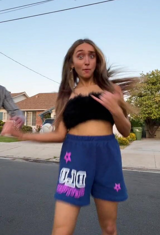 Sexy McKenzi Brooke Shows Cleavage in Black Tube Top in a Street