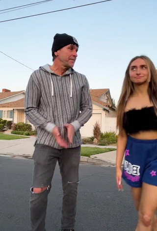 3. Sexy McKenzi Brooke Shows Cleavage in Black Tube Top in a Street