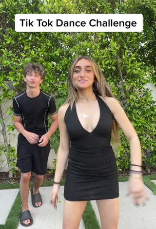 Sweetie McKenzi Brooke Shows Cleavage in Black Dress