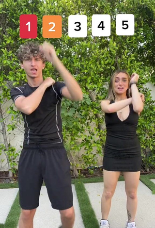 3. Sweetie McKenzi Brooke Shows Cleavage in Black Dress